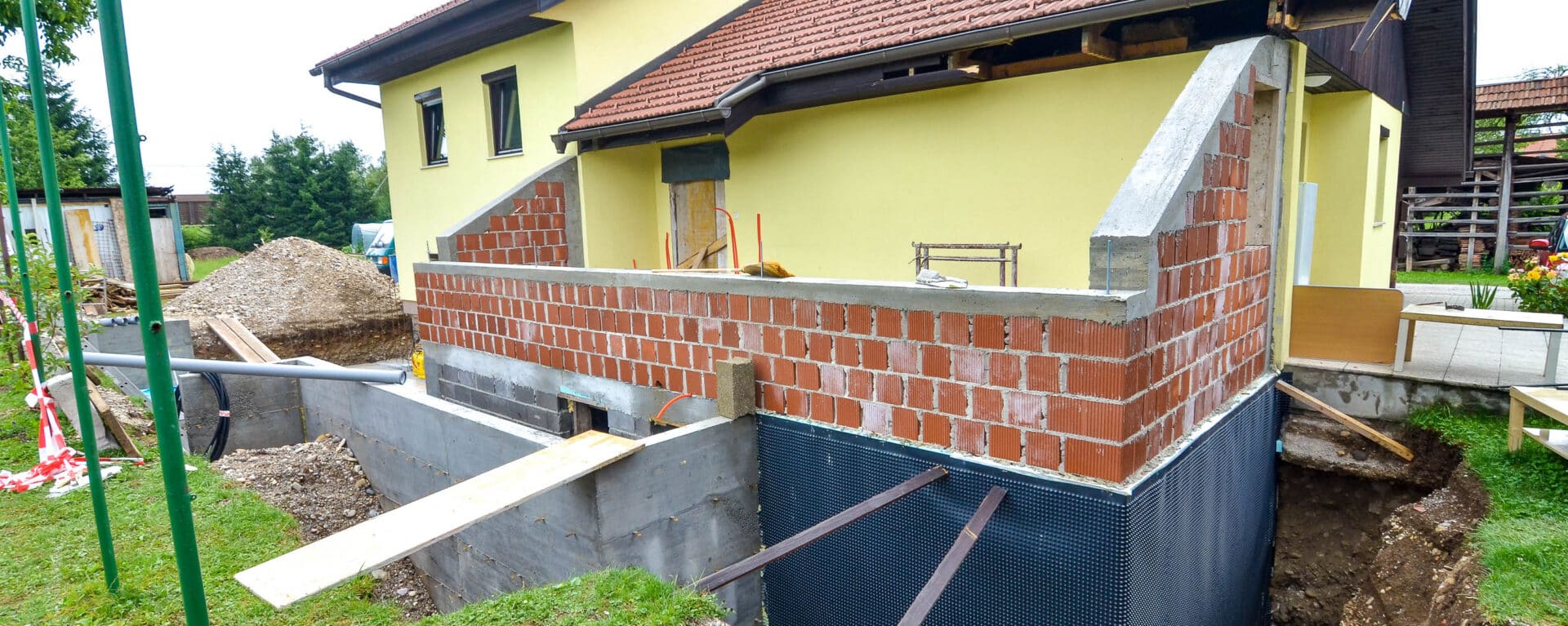 Rebuilding a family house and adding an extension